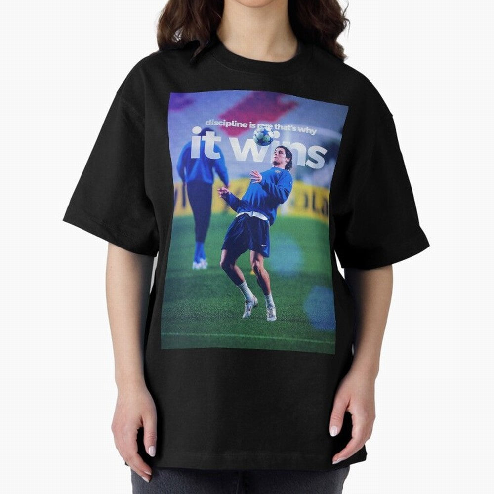 Cristiano Ronaldo - Discipline is rare that's why it wins Oversized T-Shirt Celebrate the Magic of Match Day Hype around FIFA World Cup 2026, Haaland and Mbappe, Netherlands, Retro Football Energy, Iconic Rivalries, Trophy Chase Drama and Stadium